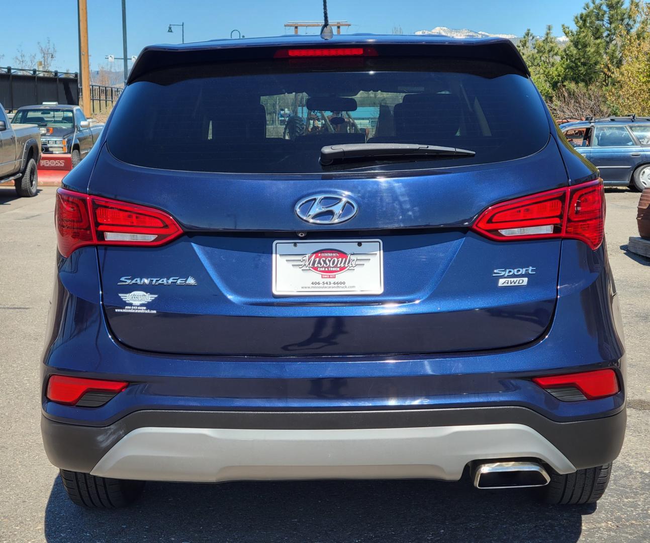 2018 Blue /Tan Hyundai Santa Fe Sport (5XYZTDLB0JG) with an 2.4L L4 engine, 6 Speed Auto transmission, located at 450 N Russell, Missoula, MT, 59801, (406) 543-6600, 46.874496, -114.017433 - Photo#5